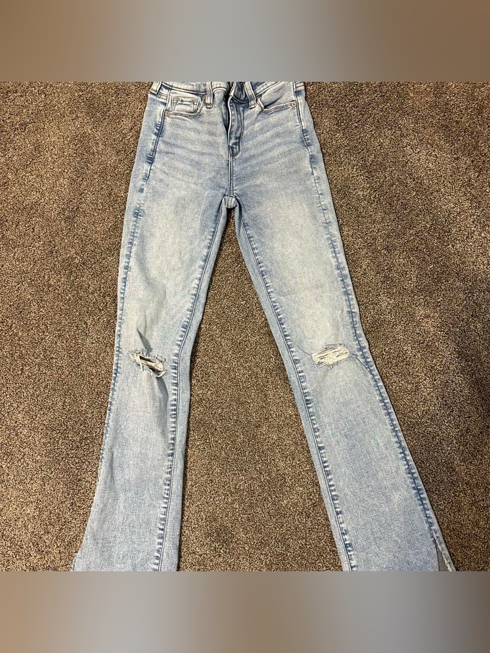 American Eagle Outfitters Light Wash Flare Jeans with Knee Rips